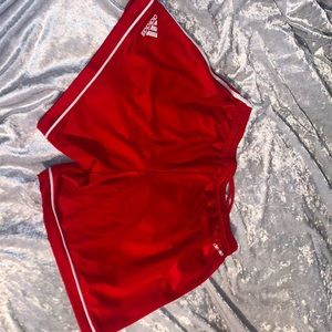 Red and white adidas shorts